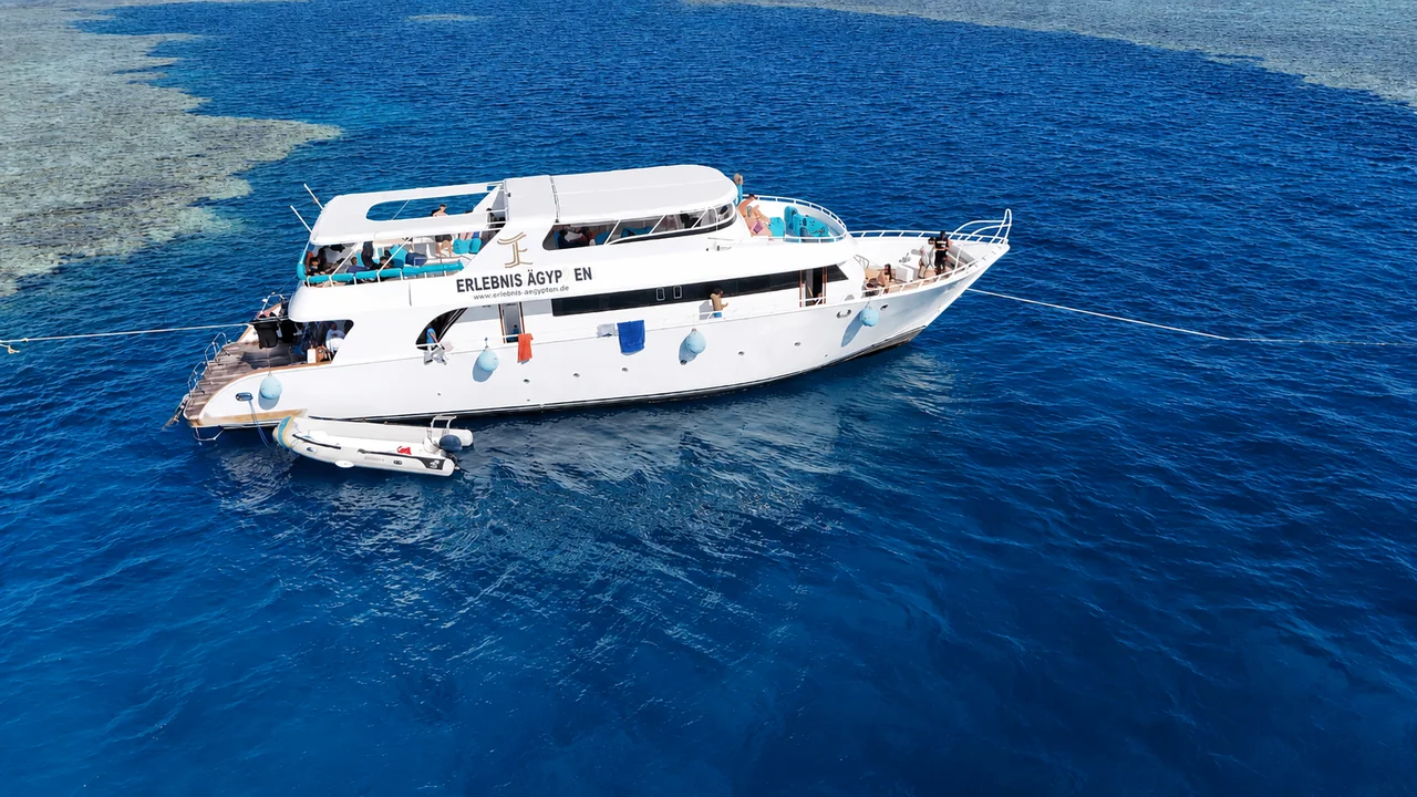 Aerial view of the Erlebnis Ägypten boat anchored at the reef